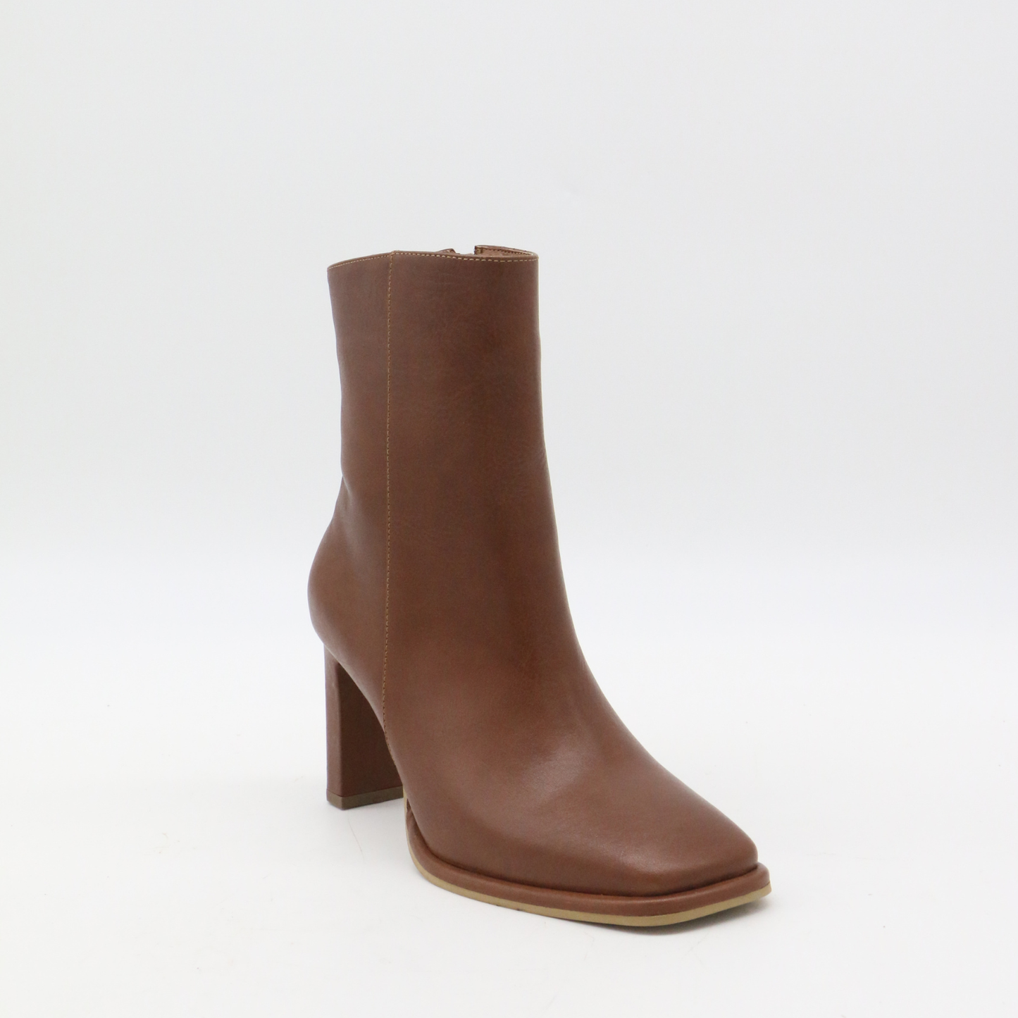 Indigo heeled ankle boots in tan leather