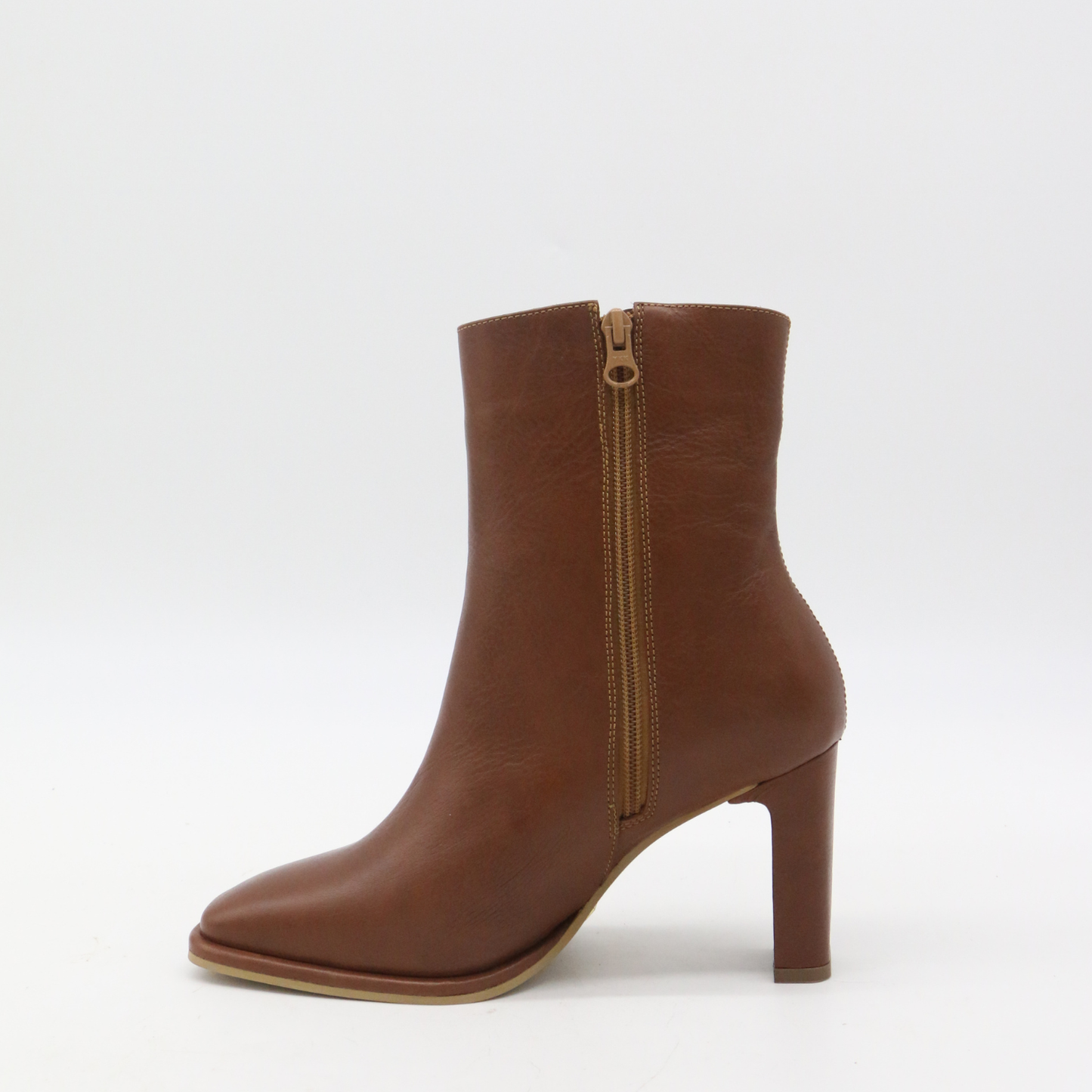 Indigo heeled ankle boots in tan leather