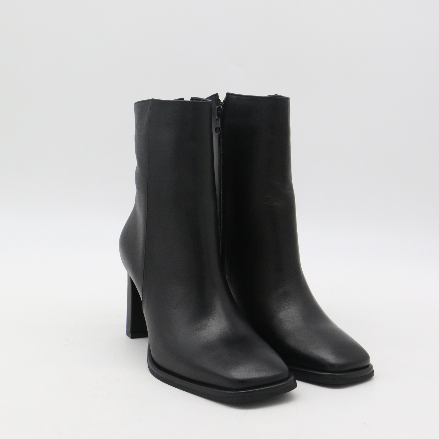 Indigo heeled ankle boots in black leather