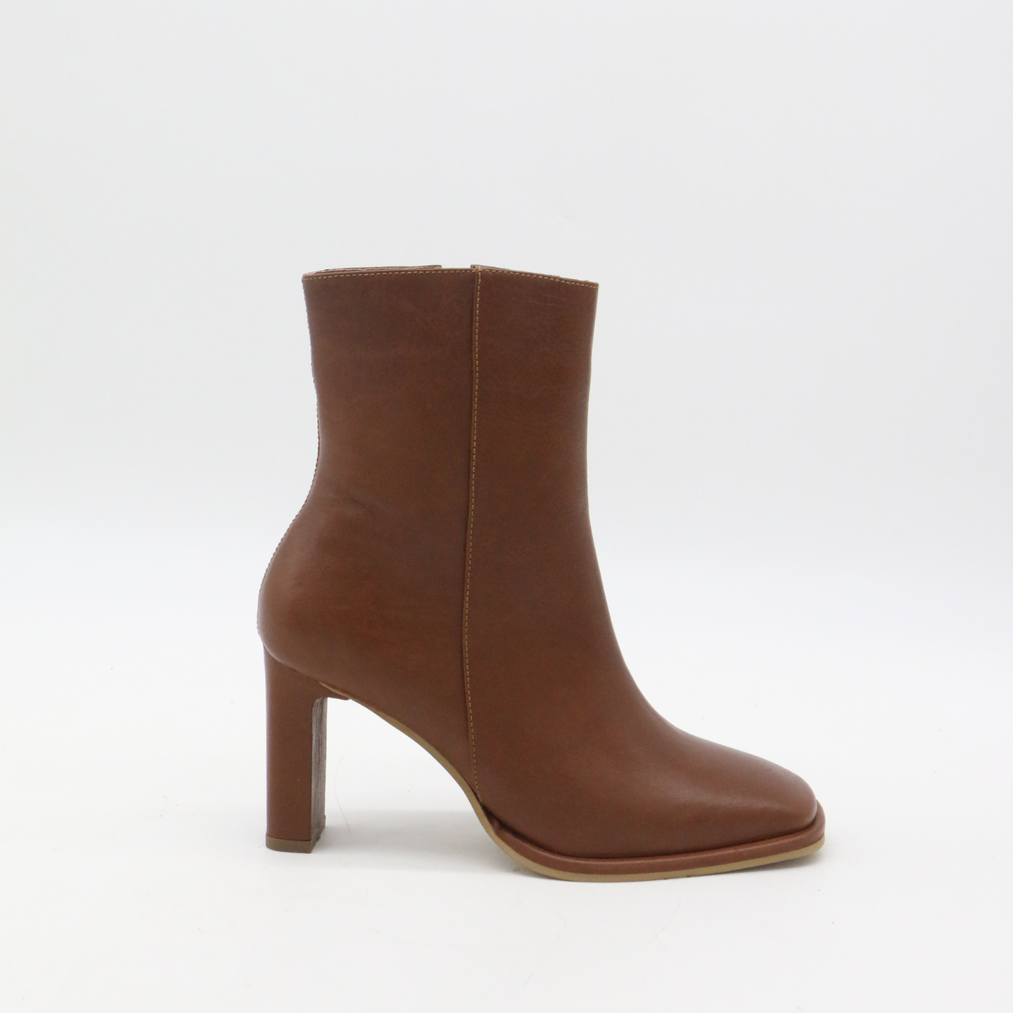 Indigo heeled ankle boots in tan leather